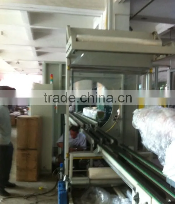 Orbital stretch wrapping machine for furniture
