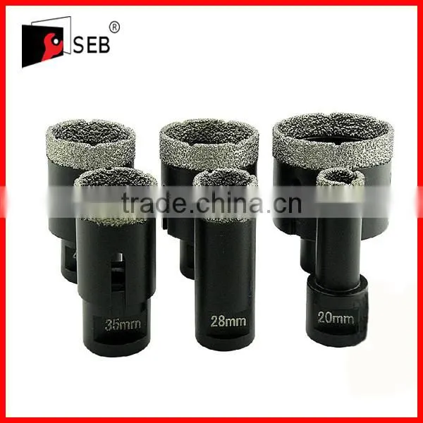 Vacuum brazed reinforced diamond core drill bits