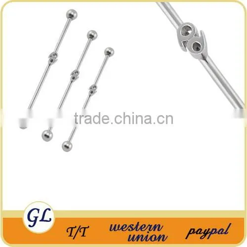Silver color long industrial barbell piercing with lady logo