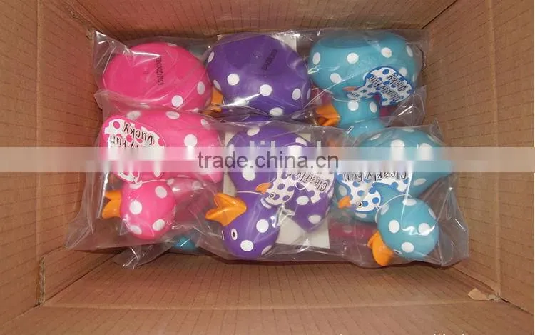 Speckled plastic duck with white dot