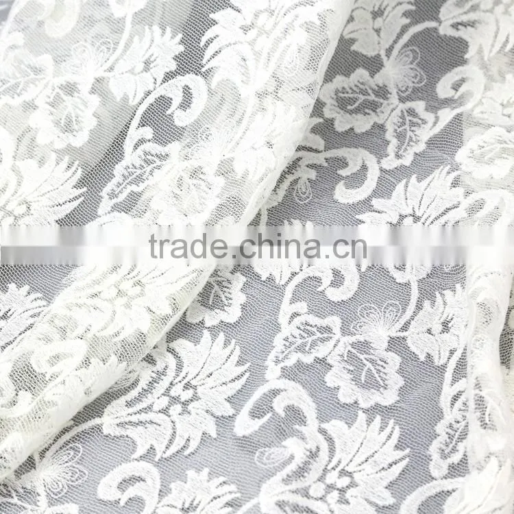 2015 New design hot sale white transparent mesh lace embroidered tulle fabric for wedding dress