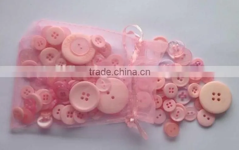 Assorted sizes pink buttons for kids handicraft making and decoration