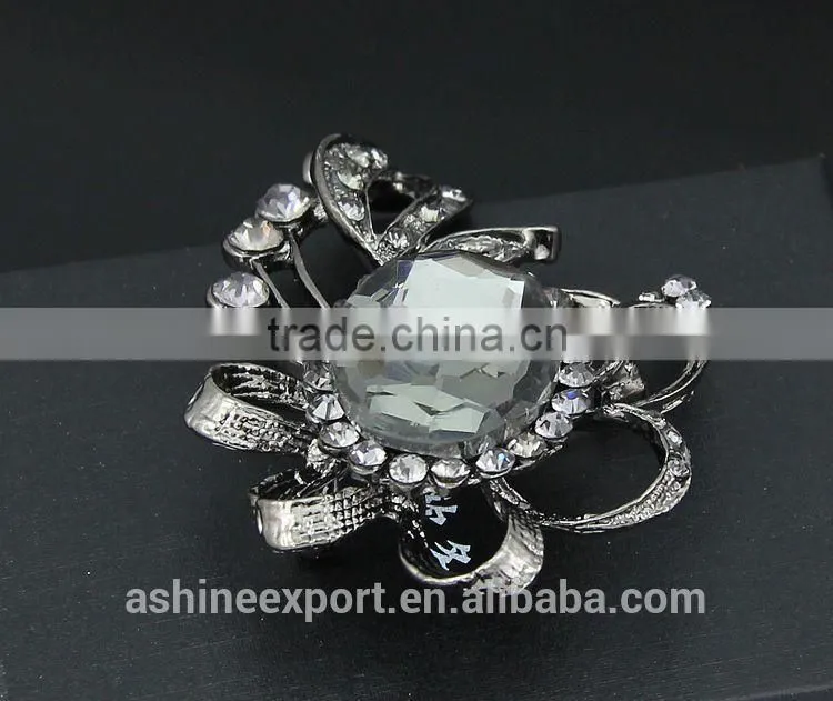 Gun black hollow ribbon shape bulk crystal rhinestone flower brooch/handmade rhinestone brooch