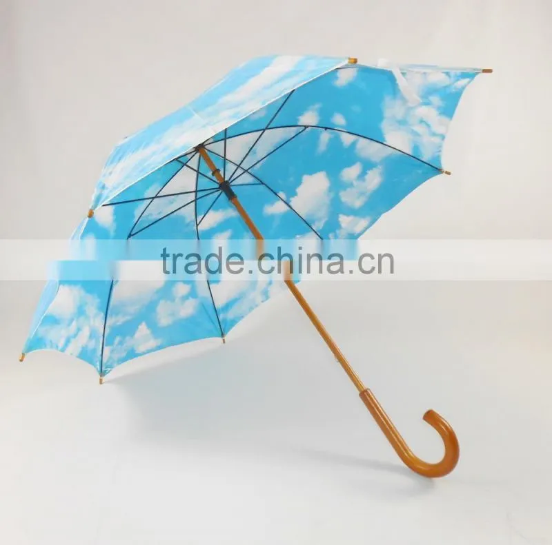 sky blue and white cloud umbrella wooden umbrella blue sky