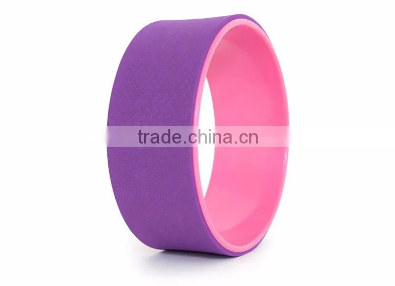 purple-pink yoga wheel
