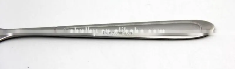 Modern stainless steel cocktail spoon in the bar