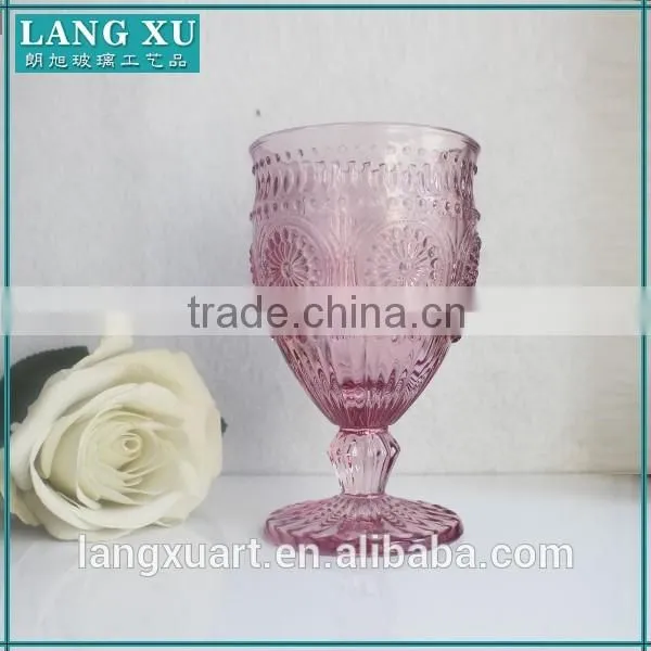 purple colored juice water goblet glass