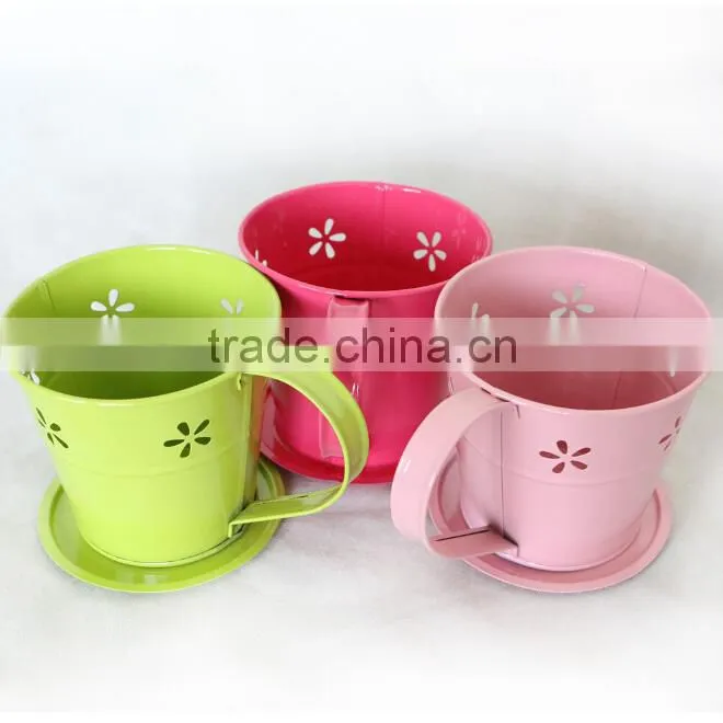lovely metal tea cup and saucer flower pot