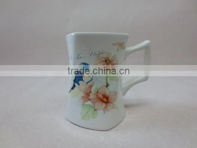 fine decal with bird and pink flower ceramic mug
