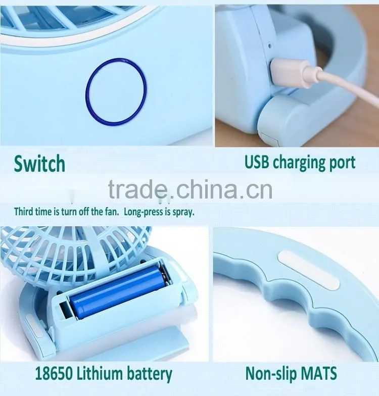 The new mini USB charging beauty spray fan humidification mini fan portable hand held air conditioner fan