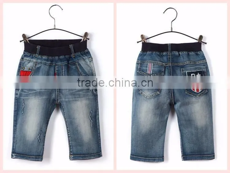 Top quality embroidery patch pocket boys ripped jeans regular fit kids jeans for Autumn