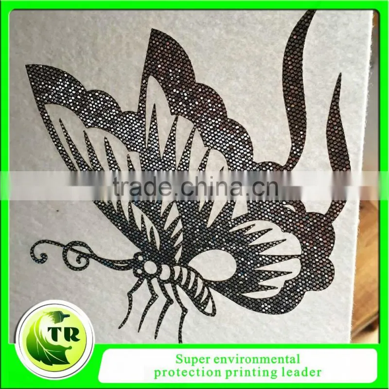 Laser cutting hot fix motif for clothing
