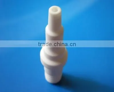 Spark plug insulator