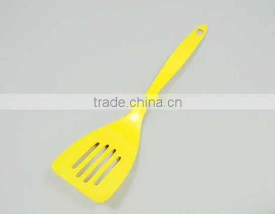 Yellow melamine spoon kitchenware cookware