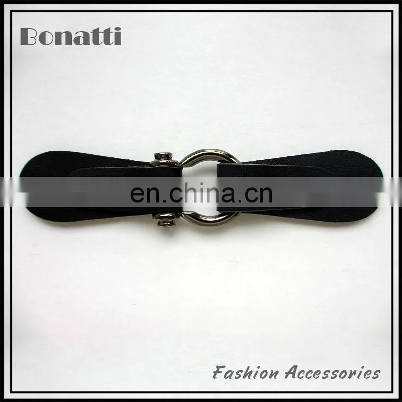 leather toggle button with golden metal buckle