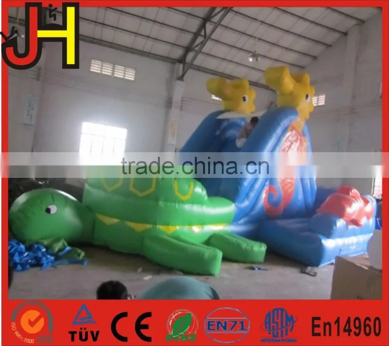 Ocean blue inflatable bounce house and slide