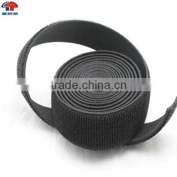 Strong elastic hook and loop fasteners for bandages