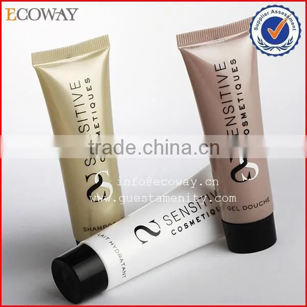 Disposable shiny colored tube with black screw cap