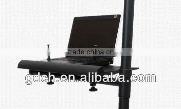 Portable folding notebook desk stand with mouse pad in bed
