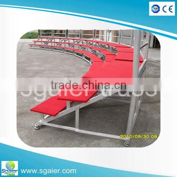 Auminum folding choral riser with plywood platforms