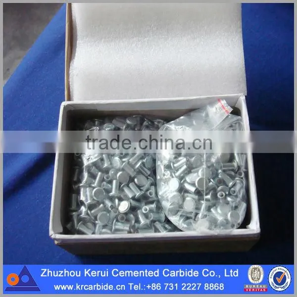 Truck tire studs with top tungsten carbide materail