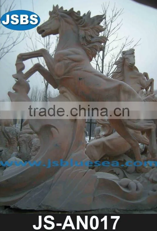 Carved travertine lion statue