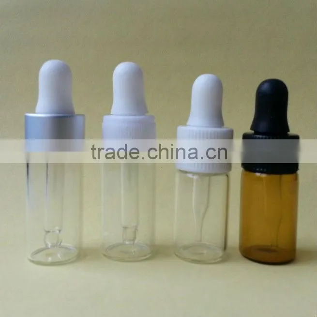 glass essential oil bottle with plastic cap and rubber dropper