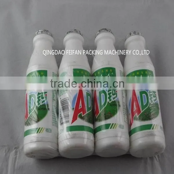 Omron PLC Control Automatic Yakult Bottles Heat Shrink Packing Machine