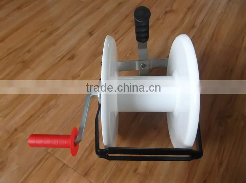Fence reel for electric fence products used to move portable fence line