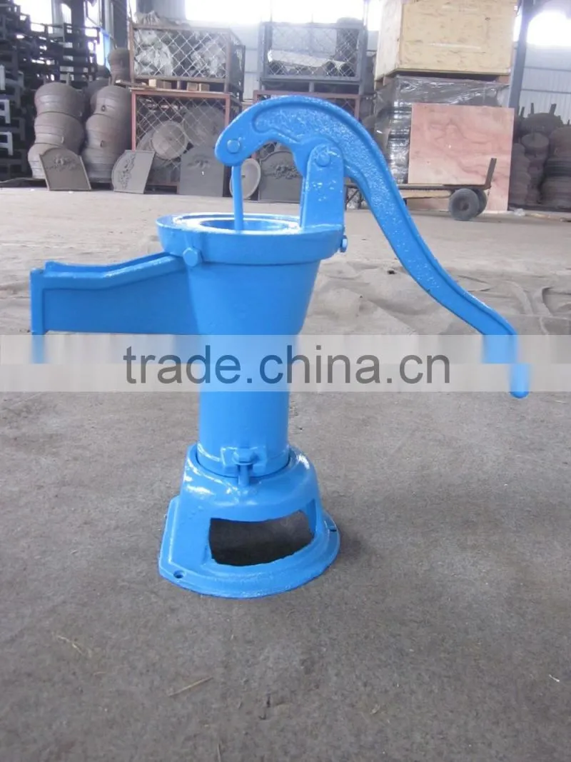 cast iron hand pump garden villiage using