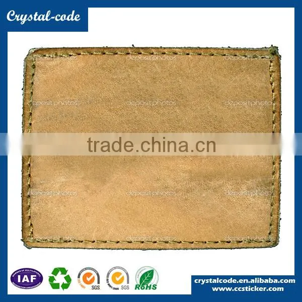 Custom embossed garment jeans faux leather label