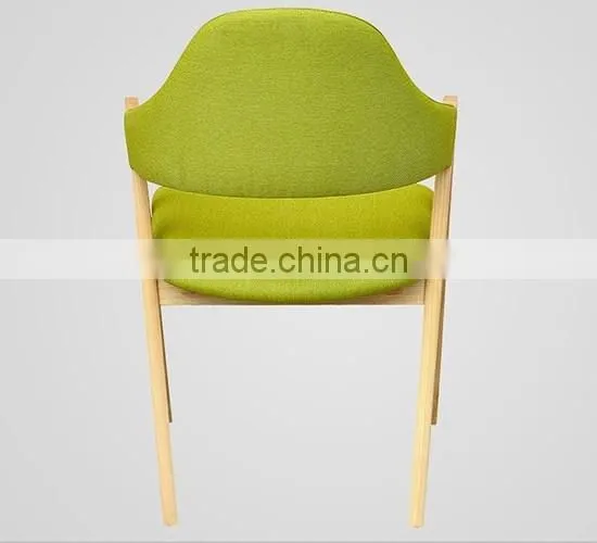 green color fabric indoor wood chair