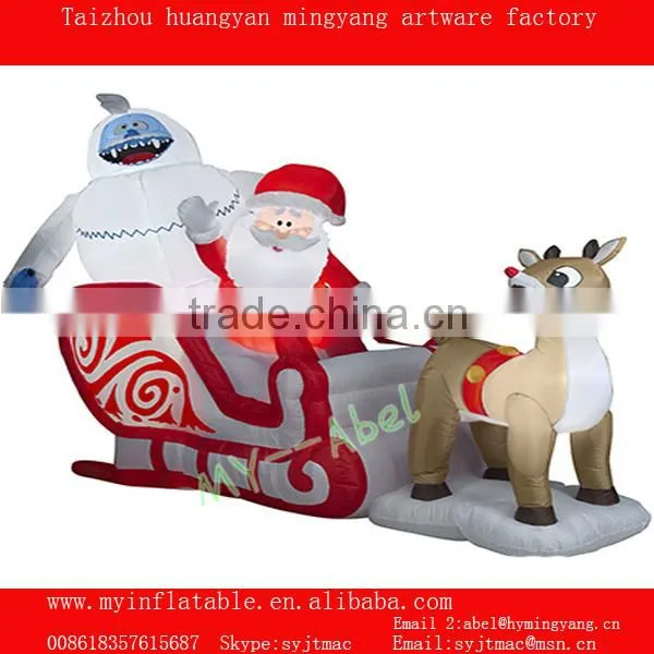 Christmas decorations santa and penguin by train