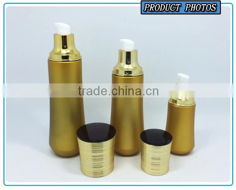 Gold yellow coloured cosmetic glass bottle and cosmetic glass cream jar