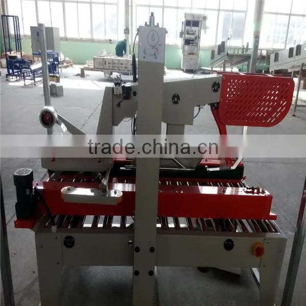 Top and bottom carton box sealing machine