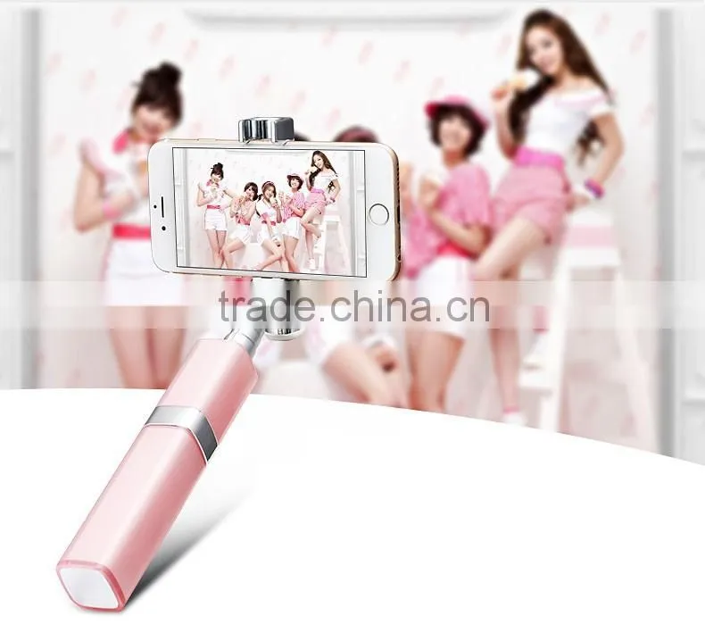 2016 New Wholesale mini automated selfie stick lip gloss selfie stick with cable for iphone and Android Smart phone
