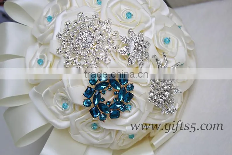 Customized Handmade wedding bouquets with gorgeous blue/ silver brooch