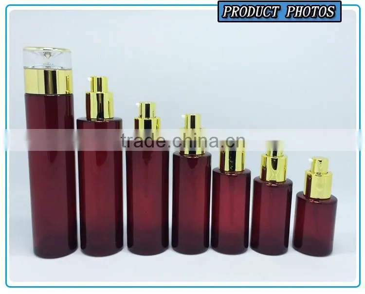 Empty green colored glass cosmetic bottle and cosmetic glass cream jar