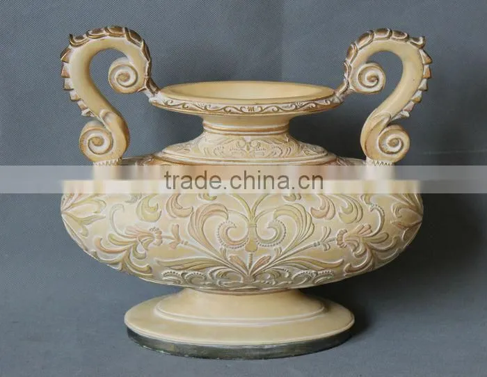 Hand carved polyresin decorative vase