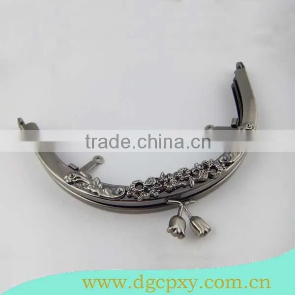 gunmetal round shape frame with flower carved pattern and flower kiss lock