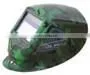 Auto-darkening welding lens