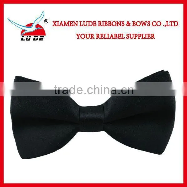 Wholesale Fasion satin ribbon bow with elastic band for packing.