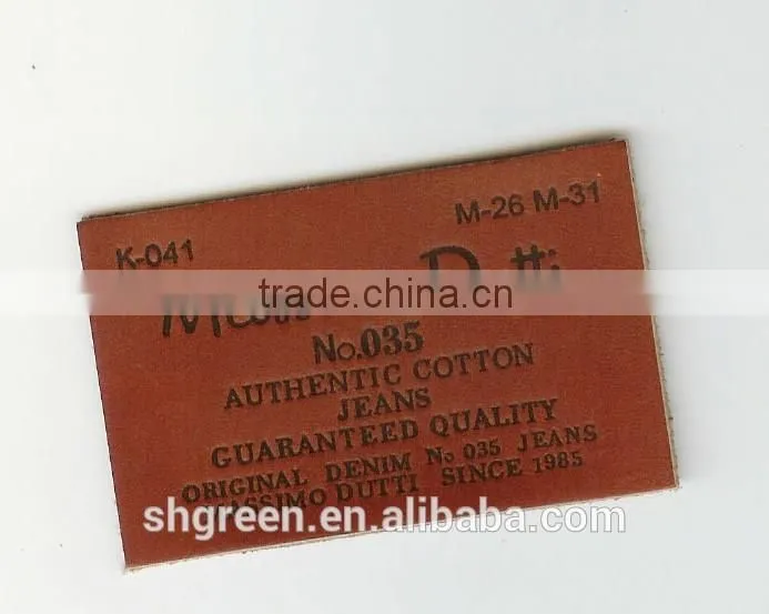 Dark brown irregular false leather label for pants