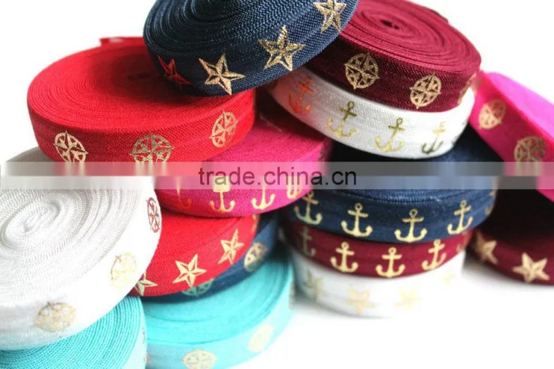 5/8" Fold Over Elastic Red with Gold Stars - Pattern, Metallic, Printed Elastic Band