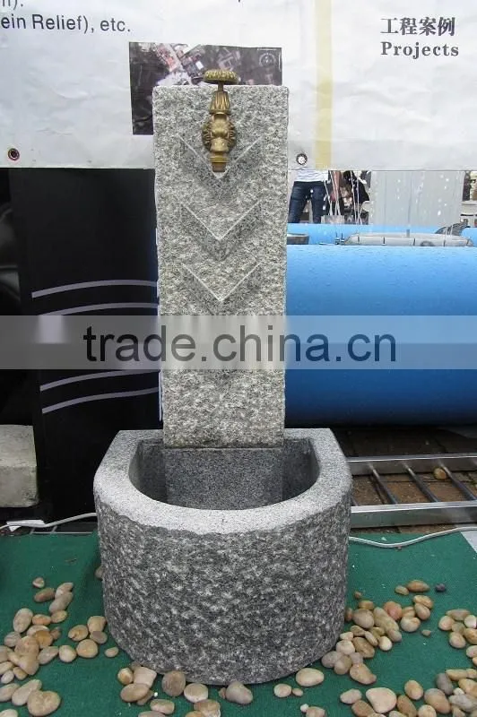 stone fountain with faucet