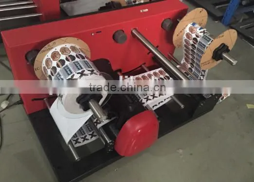 Paper roll die cutting machine with waste removal feature