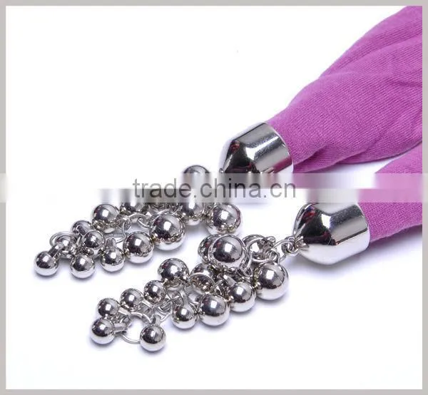 Women scarf with jewelry pendant