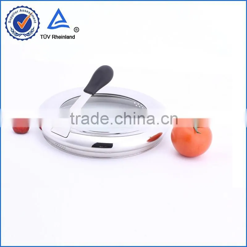 silver metal and tempered glass lid