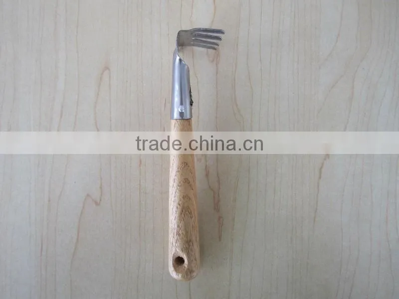 iron tool with wooden handle garden tool wooden rake wooden shovel wooden spade