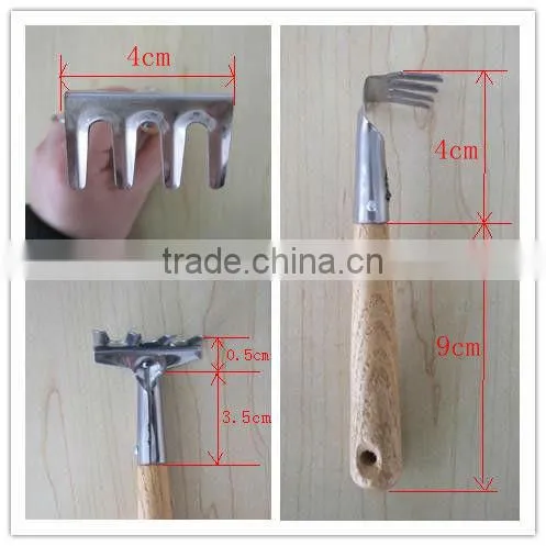 iron tool with wooden handle garden tool wooden rake wooden shovel wooden spade